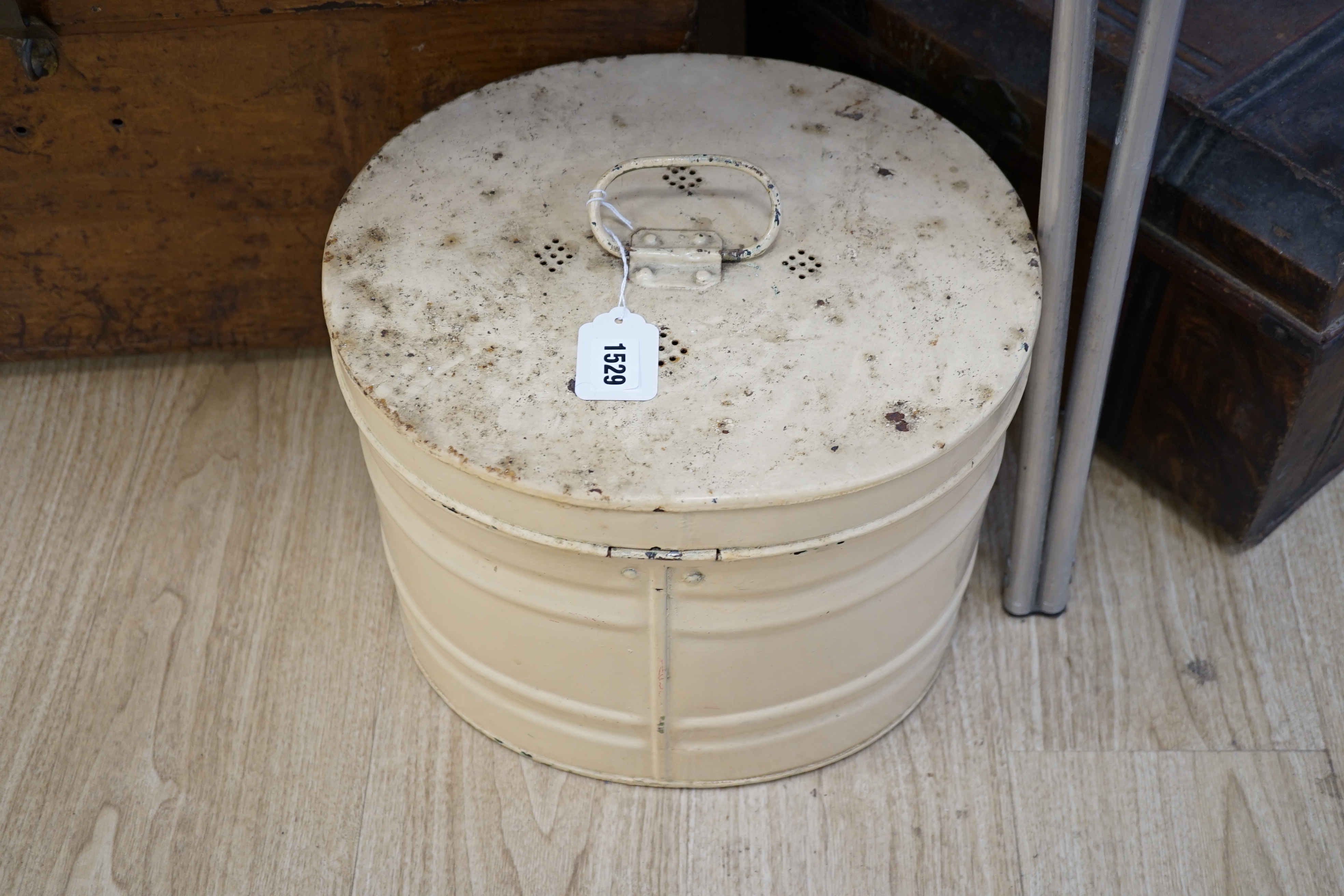 A large painted tin trunk, a smaller trunk and a cream hat tin, largest 70cm wide